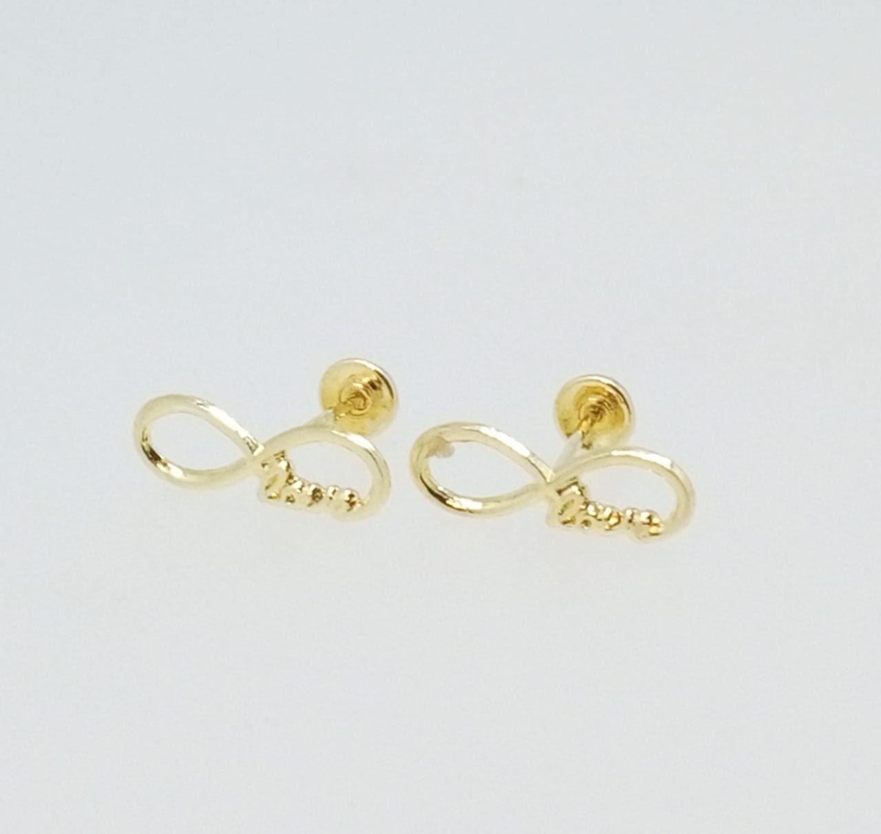 Broquel Oro 10k  símbolo infinito