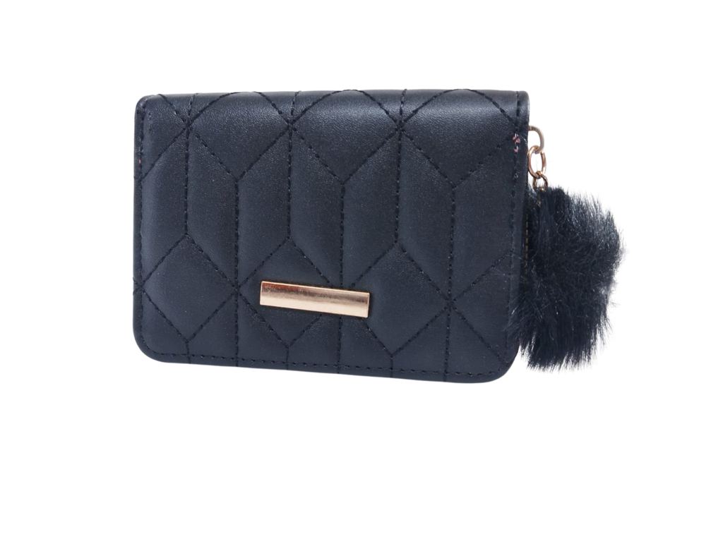 Cartera negra con formas geométricas y colgante de peluche - Vinipiel