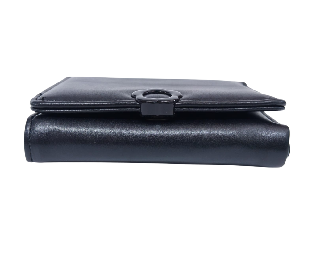 Cartera negra lisa con broche de flor - Vinipiel