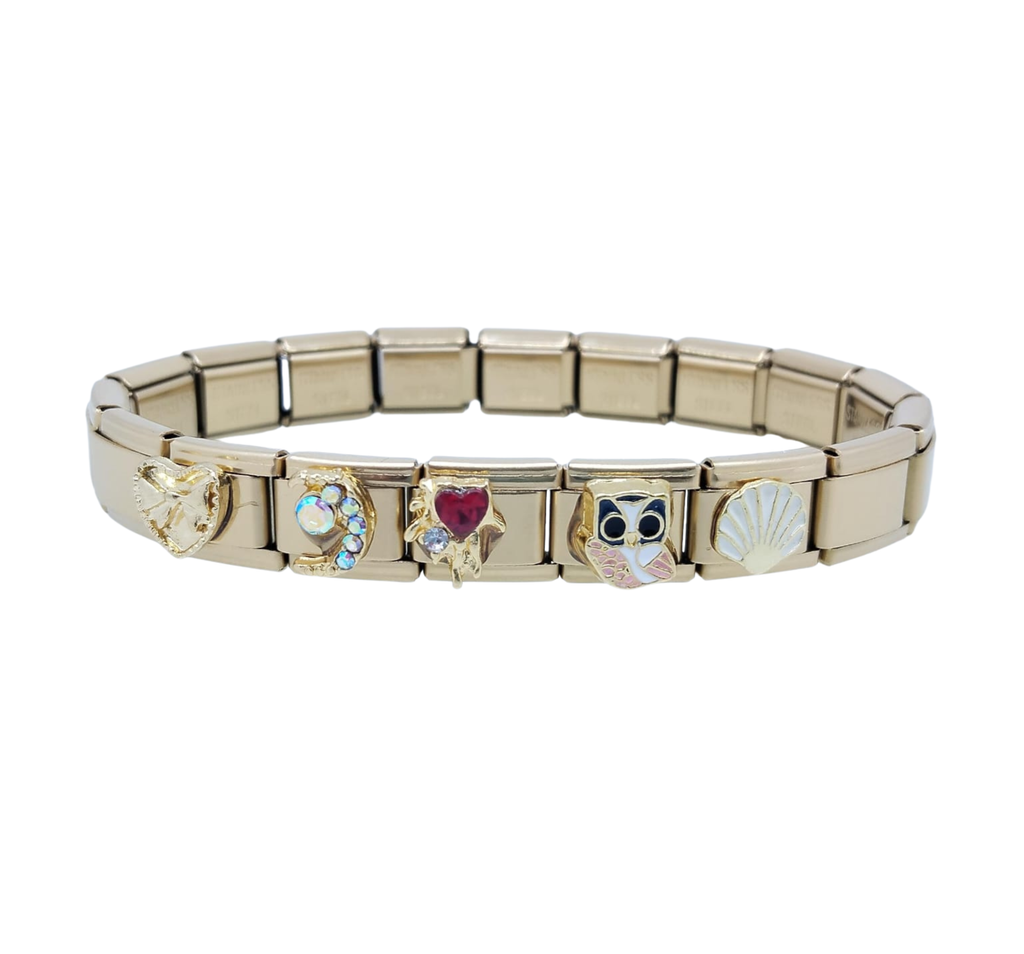 Pulsera Italiana Dorada con 5 Dijes Dos Corazones, Concha de Mar, Búho y Delfín – Acero Inoxidable