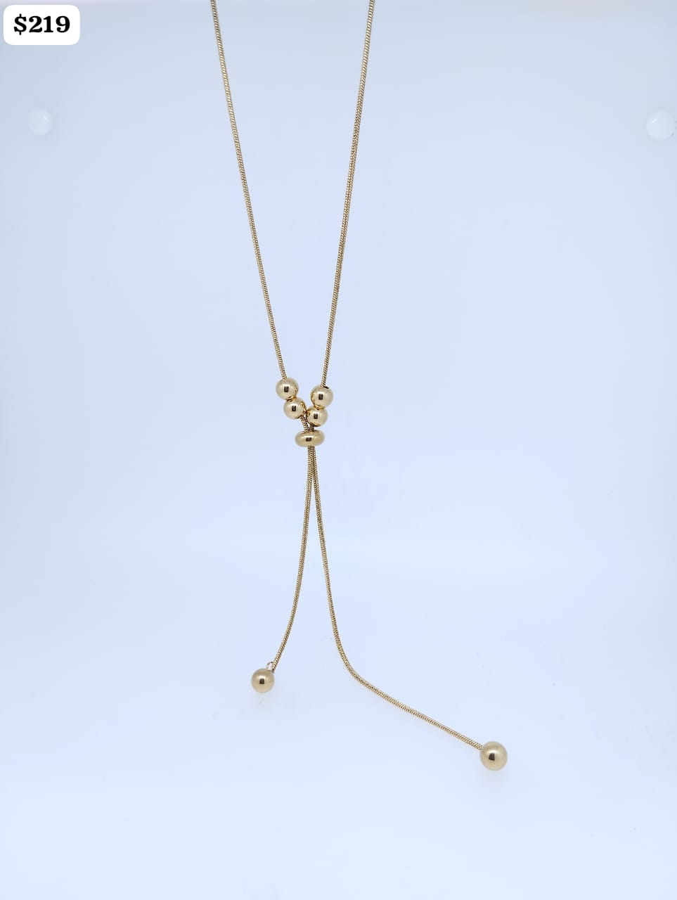 Cadenita Acero color dorado tipo corbatero 6 bolitas